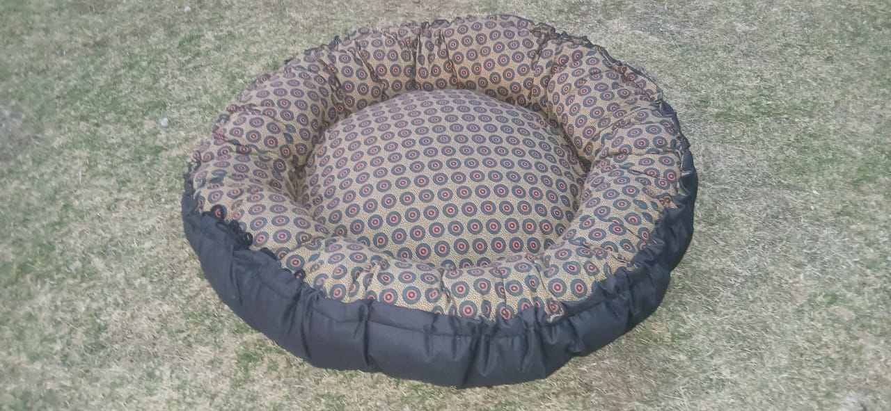 Round patterned pet bed made by Martha